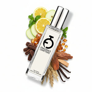 Perfume bottle with fruit and floral elements on a light background