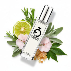 A clear glass bottle with a silver cap, labeled 'OUD SATIN MOOO' by Fragrance Crafters.