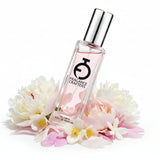 A clear glass bottle with a silver cap and a label that reads 'FRAGRANCE CRAFTERS'.